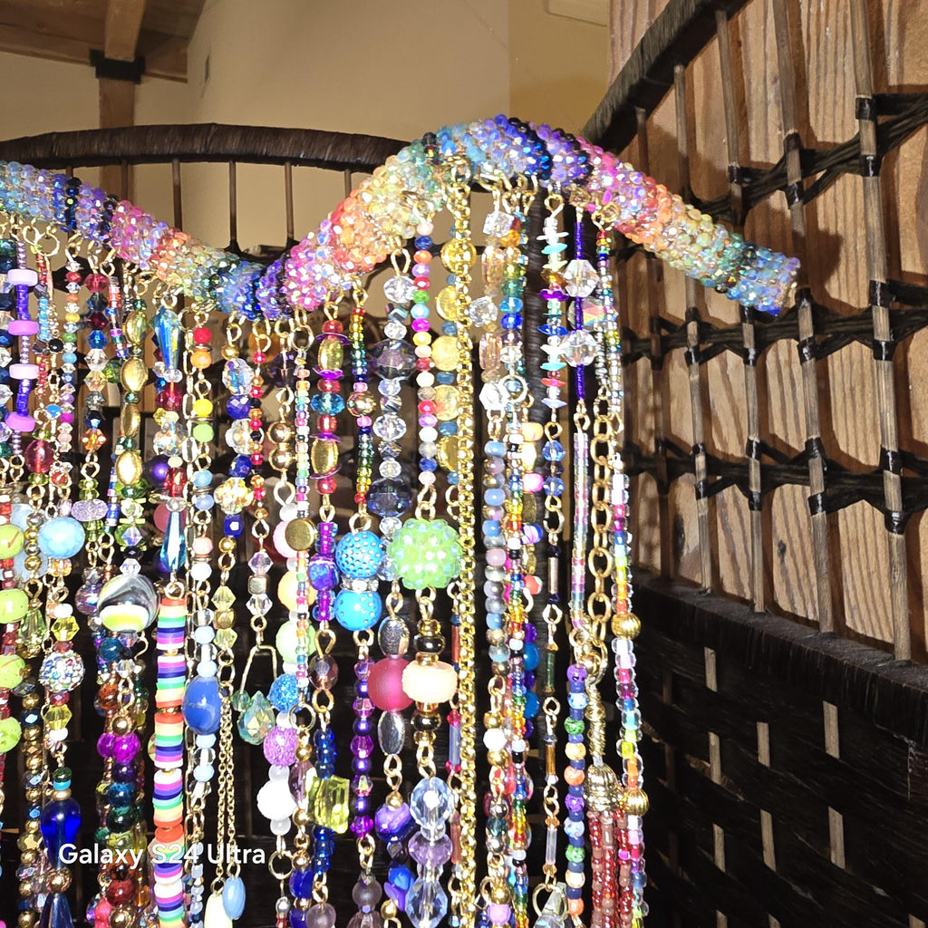 Handcrafted, rhinestone covered driftwood, beaded windchime/suncatcher.