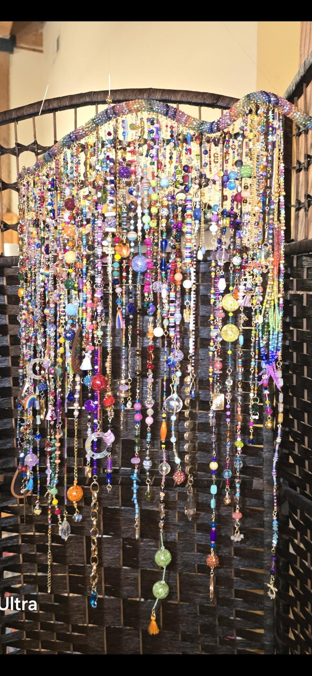 Handcrafted, rhinestone covered driftwood, beaded windchime/suncatcher.