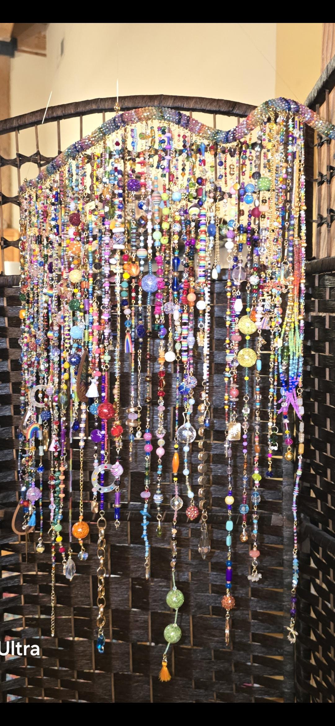 Handcrafted, rhinestone covered driftwood, beaded windchime/suncatcher.
