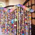 Handcrafted, rhinestone covered driftwood, beaded windchime/suncatcher.